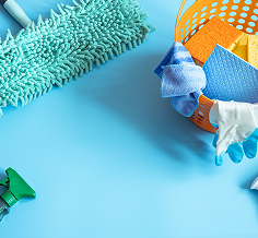 Cleaning supplies on blue surface